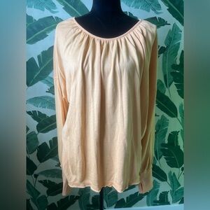 Free People Movement Light Orange Open Back Thumbhole Top Size M NWOT